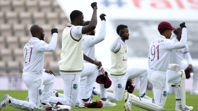 West Indies captain Jason Holder and his teammates take a knee during day one of the First Test against England in July. Picture: Mike Hewitt/Getty Images