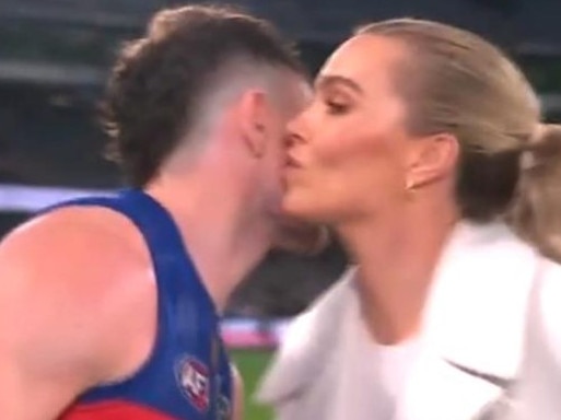 Lachie Neale kisses Abbey Holmes following the Lions v Bulldogs match on June 7, 2024. Picture: Channel 7