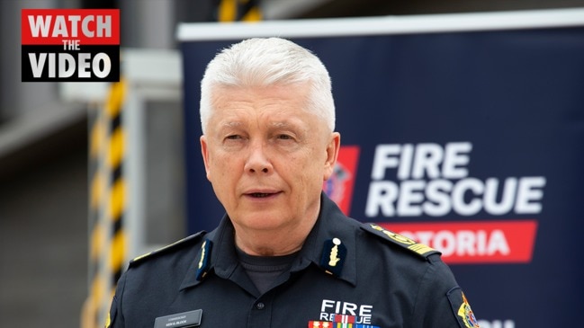 Fire rescue commissioner Ken Block talks with FRV leaders