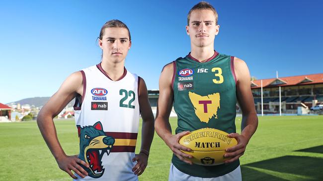 Nic Baker, left, who kicked the Tasmania Devils first goal in their inaugural under-18 NAB League match, with Oliver Davis. Picture: LUKE BOWDEN