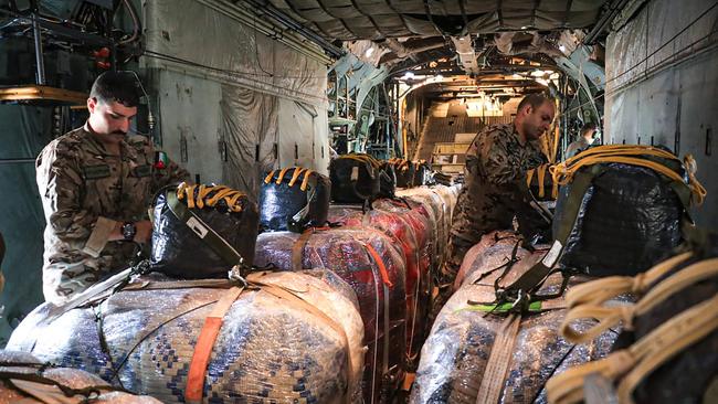 Humanitarian aid is prepared to be airdropped from a Jordanian military aircraft over the Gaza Strip. Picture: AFP