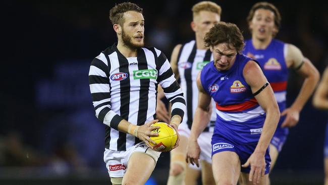 James Aish runs away Liam Picken on Friday night.