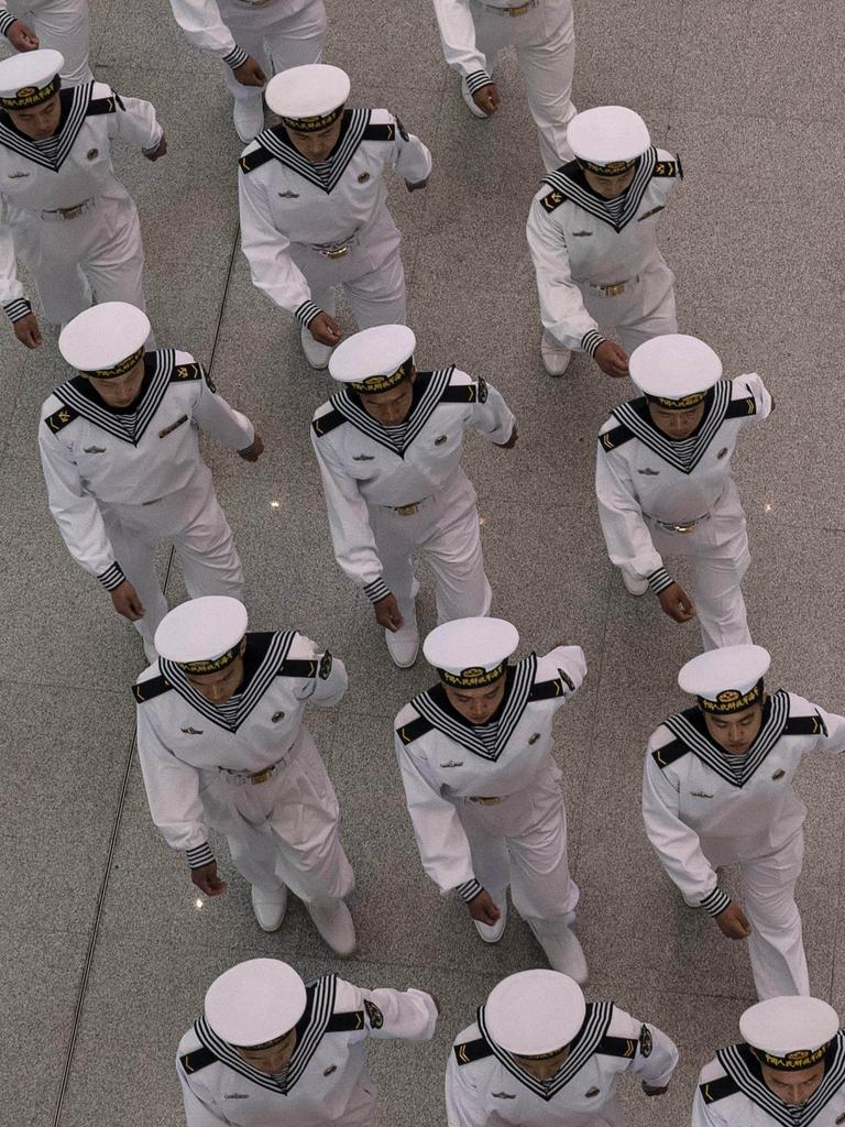 Chinese PLA Navy sailors march together. Picture: Kevin Frayer/Getty Images