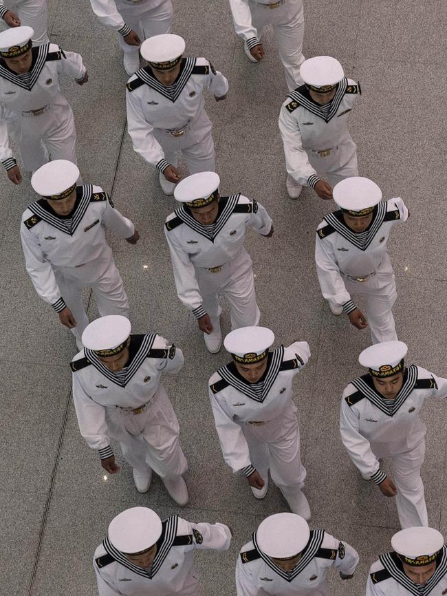 Chinese PLA Navy sailors march together. Picture: Kevin Frayer/Getty Images