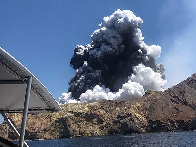 A plume of ash rising into the air as the volcano on White Island erupts off the coast of Whakatane on New Zealand's North Island. Picture: AFP