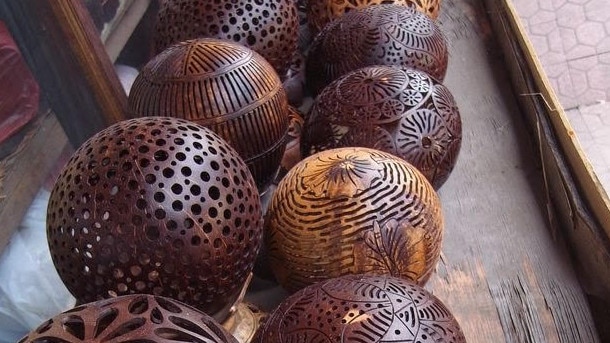 The business was inspired by these coconut candleholders spotted in a Balinese market in 2015. Picture: Supplied