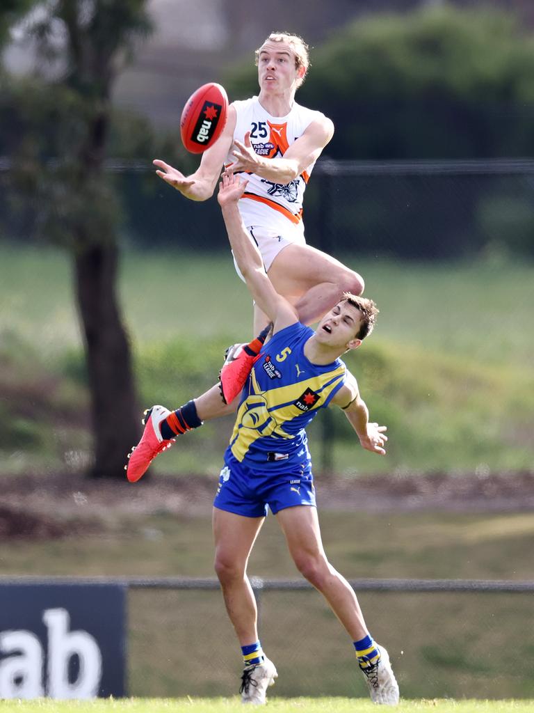 NAB League. Calder Cannons vs Western Jets at Craigieburn. 20/06/2021.  Josh Goater marks over Kyle Borg    .  Pic: Michael Klein