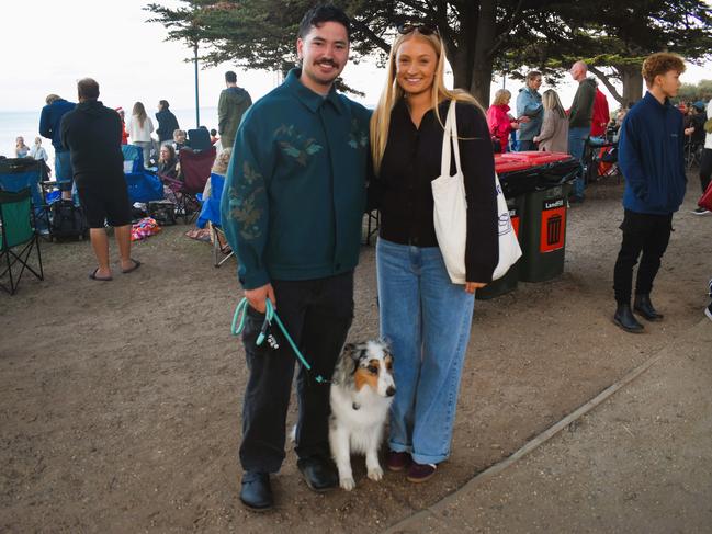 Zane Javier, Oakley and Emma Spencer getting festive at the Phillip Island Christmas Carols by the Bay at the Cowes Foreshore on Tuesday, December 10, 2024. Picture: Jack Colantuono