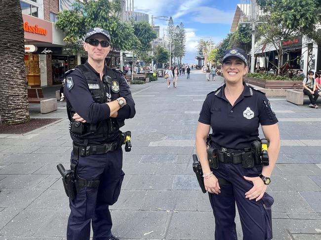 Senior Constable Nicholas Roberts and Senior Constable Rochelle Novytarger at Cavill Ave in Surfers Paradise on Friday April 26, where police were conducting wanding operations as part of Operation Whiskey Legion. Picture: Keith Woods.