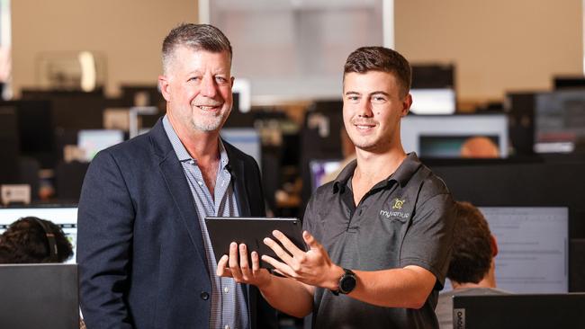 MyVenue chief executive Tim Stollznow with developer Angus Juers. Picture: Russell Millard