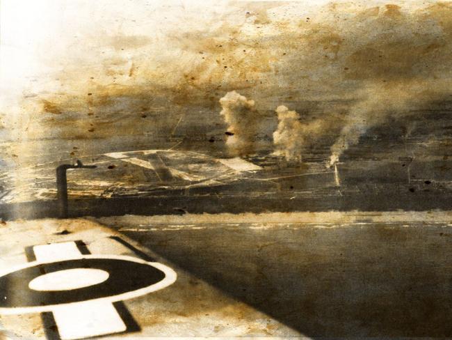 A Japanese airfield burns, as seen from the cockpit of a Royal Navy Fleet Air Arm Avenger bomber. Source: Imperial War Museum