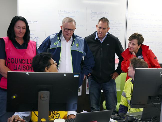 BRISBANE, AUSTRALIA - MARCH 9:  Prime Minister Anthony Albanese, Treasurer Jim Chalmers and the Minister for Emergency Management, Jenny McAllister, during a visit to the Logan disaster management centre on March 9, 2025 in Brisbane, Australia. Australia's east coast is experiencing severe weather as ex-Tropical Cyclone Alfred moves south. While downgraded from cyclone status, the weather system continues to bring damaging winds, heavy rainfall, and flash flooding, particularly in the Gold Coast and northern NSW regions. Authorities have issued severe weather warnings, and coastal areas remain at risk of significant erosion and hazardous surf conditions. Residents are urged to stay updated on local warnings, avoid floodwaters, and prepare for ongoing disruptions. (Photo by Tertius Pickard - Pool/Getty Images)