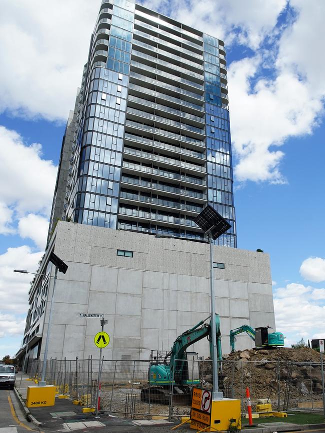 Photo of Bensons Property Group project Liberty 1 building in Footscray with diggers in the front where Liberty 2 was to be built. Picture: NewsWire / Luis Enrique Ascui