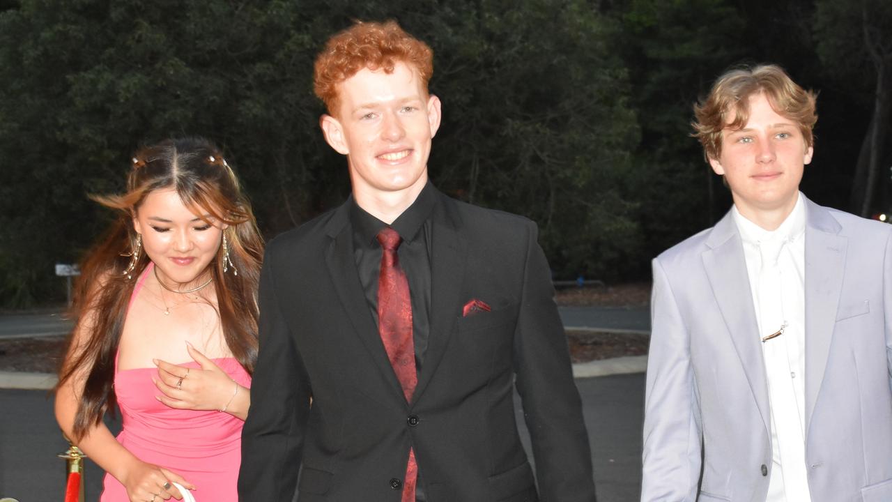 Sunday Moore, Gus Butler and Finn McGarvey at the Year 11 Good Shepherd formal, 2022.