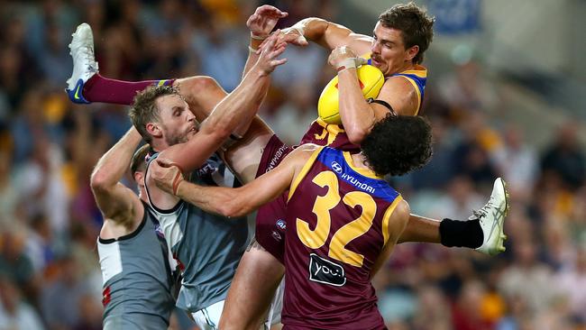 Daniher takes a towering mark against Port Adelaide. Picture: AFL Photos/Getty Images