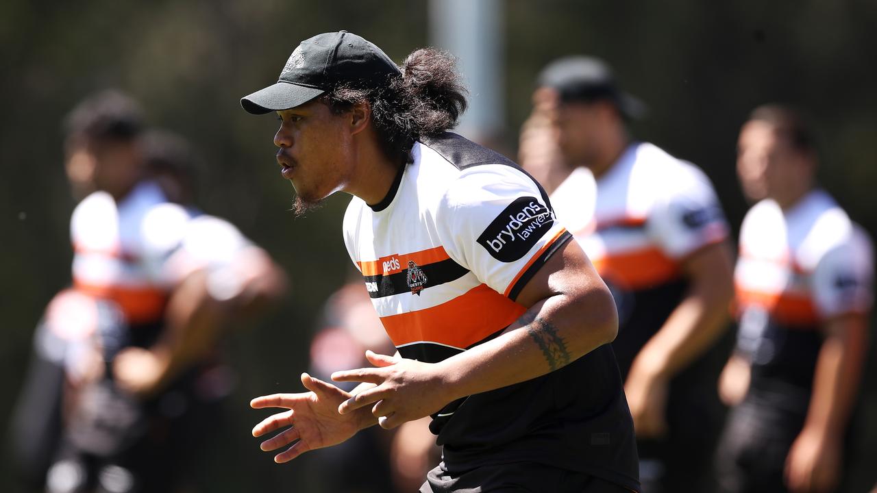 SYDNEY, AUSTRALIA - DECEMBER 07: Luciano Leilua runs during a drill at the Wests Tigers NRL training session at St. Luke's Park North on December 07, 2020 in Sydney, Australia. (Photo by Mark Kolbe/Getty Images)