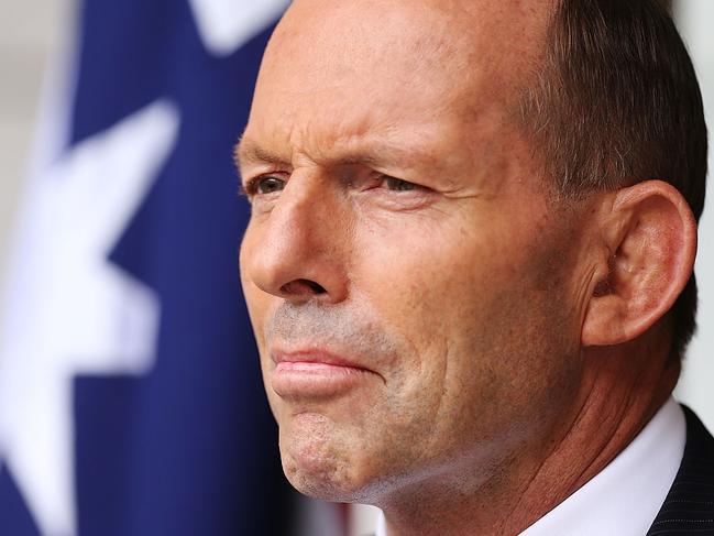 CANBERRA, AUSTRALIA - FEBRUARY 09: Prime Minister Tony Abbott speaks during a press conference at Parliament House on February 9, 2015 in Canberra, Australia. Tony Abbott remains Prime Minister of Australia after a spill motion failed at a Liberal party meeting this morning. The motion was defeated, 39 to 61 in favour of Abbott. (Photo by Stefan Postles/Getty Images)