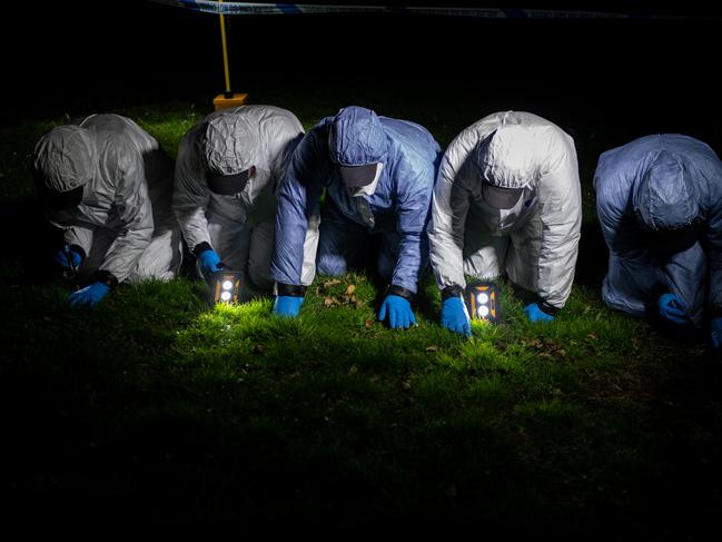 Police officers conduct a fingertip search of Poynders Road as they continue the search for Sarah Everard. Picture: Chris J Ratcliffe/Getty Images