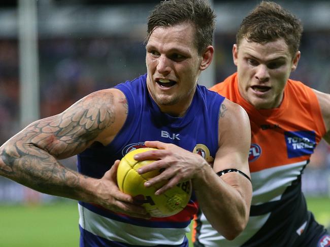 Clay Smith gives Heath Shaw the slip in the preliminary final. Picture: Wayne Ludbey