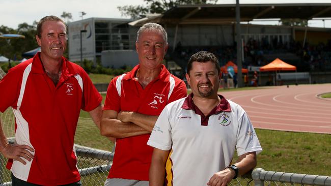 Hills Athletics academy coaches Graham Garnett and Howard Searle with vice president Jonathan Eagleton.