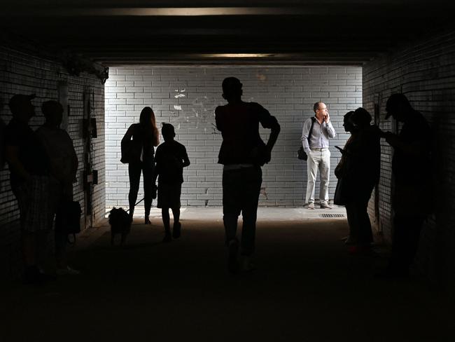 People take shelter in an underground crossing during the hit on Kyiv. Picture: AFP