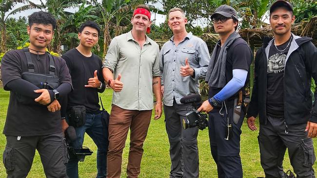 The Best Ever Food Review Show team, producer Dau Xuan Vu, cameraman Dinh Tuan Anh,  host Sonny Side, with Travis McCombe from PNG Experience, cameraman Tran Quang Dao, and editor Nguyen Van Qui in Papa New Guinea.