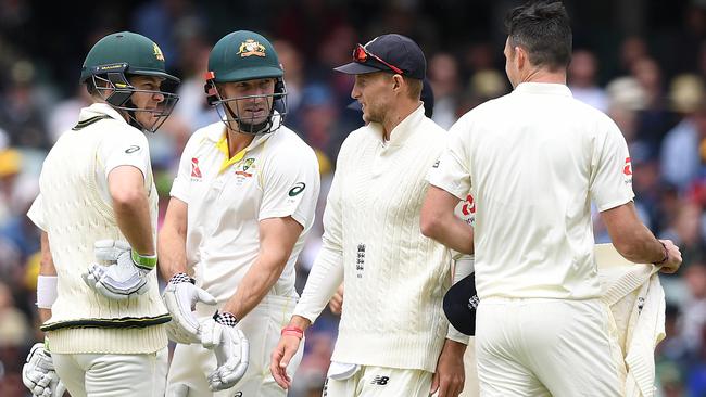 Tim Paine and Shaun Marsh have words with James Anderson.