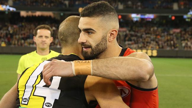 Richmond's Bachar Houli and Essendon's Adam Saad made a statement against Senator Fraser Anning’s comments. Picture: Michael Klein