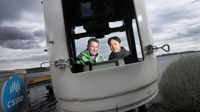 Penguin researchers, from left, Dr Tim Lynch and Dr Jin Woo Jung will be taking a number of CSIRO Ruggedised Autonomous Gigapixel System cameras down to Antarctica to study penguins. Picture: LUKE BOWDEN