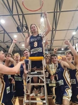 Ansett captain Matty Hunt leads his team's celebrations after the Blues beat Palmerston in the 2021 Darwin Basketball League Final. Picture: Supplied