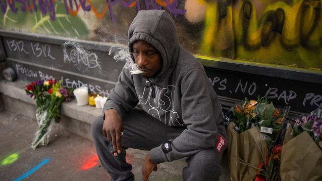 Derel Jenkins sits at a memorial near the site of where his cousin, Lorenzo, was killed adjacent to the protest area known as CHOP in Seattle, Washington. Picture: David Ryder/Getty Images/AFP