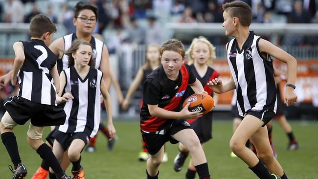 MELBOURNE, AUSTRALIA – APRIL 25: General Auskick action during the 2019 AFL round 06 ANZAC Day match between the Essendon Bombers and the Collingwood Magpies at the Melbourne Cricket Ground on April 25, 2019 in Melbourne, Australia. (Photo by Dylan Burns/AFL Photos)