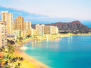 One-and-a-half-mile-long Waikiki Beach offers something for just about every kind of holidaymaker / Supplied