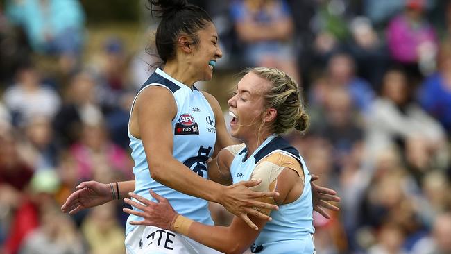 Lauren Arnell celebrates a goal with star Darcy Vescio. Picture: Sarah Reed