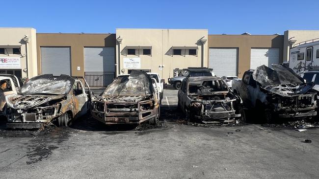 Burnt out cars at a Biggera Waters business after a suspected arson attack. Picture: Keith Woods.