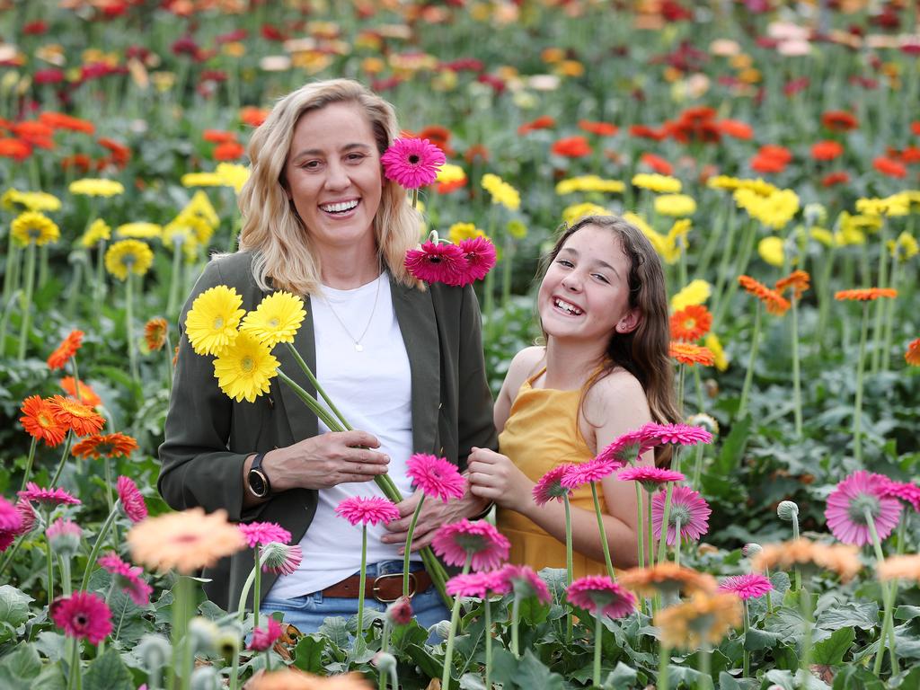 Sonia Bitmead with her daughter Molly, 12, at their flower farm at Karalee. Pics Tara Croser.