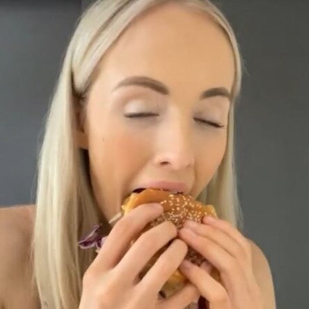 Bec looked happy with her burger. Picture: TikTok/BecHardgrave