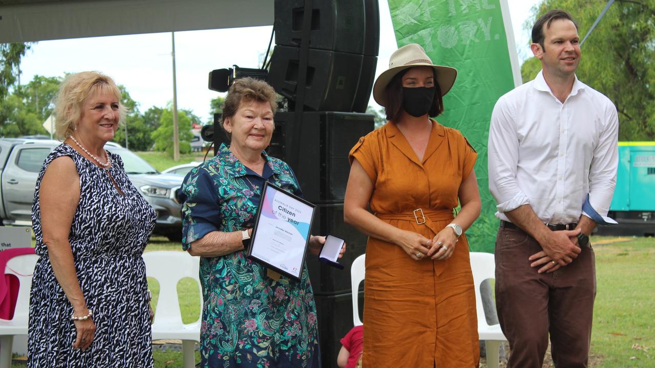 Jennifer Hilcher receives her Citizen of the Year award from Michelle Landry, Matt Canavan and Brittany Lauga.