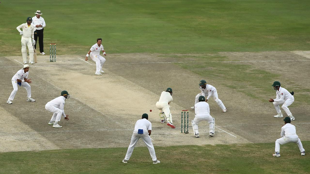 Tim Paine defends in the final over to save the first test.