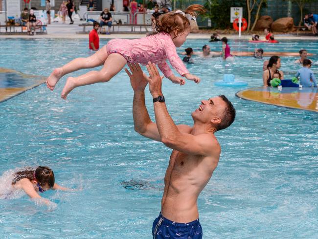 FEBRUARY 12, 2022: Peter Malinauskas with his daughter Eliza at the Adelaide Aquatic Centre in North Adelaide where he announced plans to redevelop the site if Labor wins the March election. Picture: Brenton Edwards