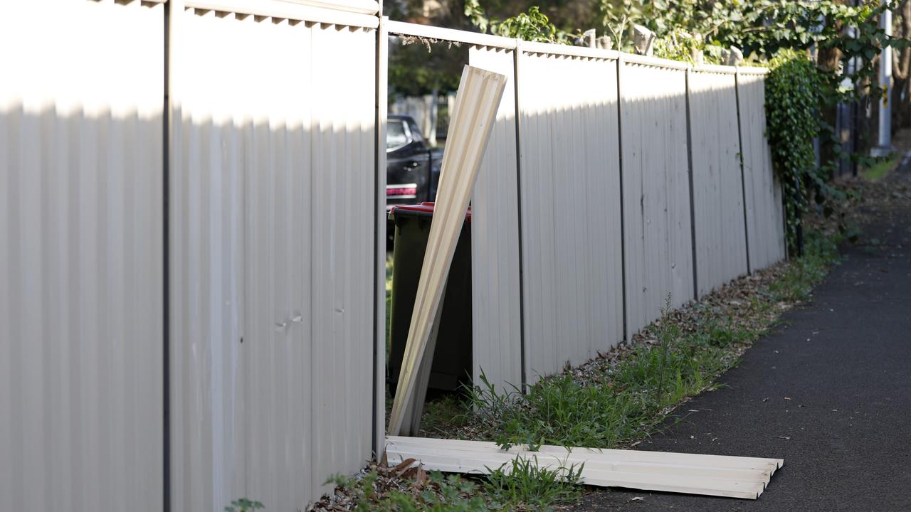 A damaged fence off Lambert Street in Plumpton. Picture: NewsWire/Damian Shaw.