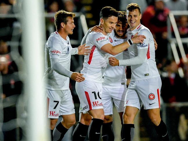 Alexander Baumjohann (centre) of the Wanderers reacts after scoring against Bonnyrigg during the FFA Cup Round of 16 match between the Bonnyrigg White Eagles and the Western Sydney Wanderers at Marconi Stadium in Sydney, Wednesday, August 29, 2018. (AAP Image/Brendan Esposito) NO ARCHIVING, EDITORIAL USE ONLY
