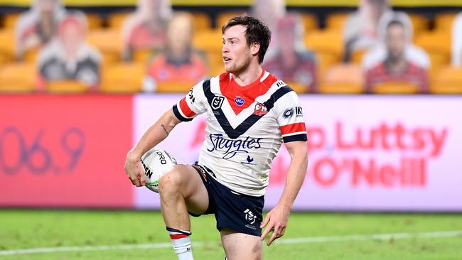 BRISBANE, AUSTRALIA - JUNE 04: Luke Keary of the Roosters scores a try during the round four NRL match between the Brisbane Broncos and the Sydney Roosters at Suncorp Stadium on June 04, 2020 in Brisbane, Australia. (Photo by Bradley Kanaris/Getty Images)