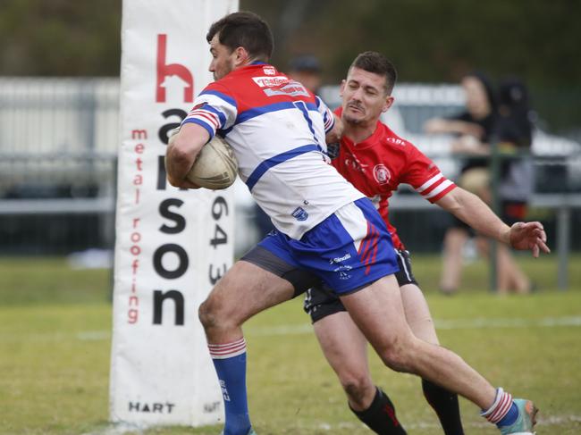 Emu Plains fullback Jake Bentley takes on Robert Henderson. Picture: Warren Gannon Photography