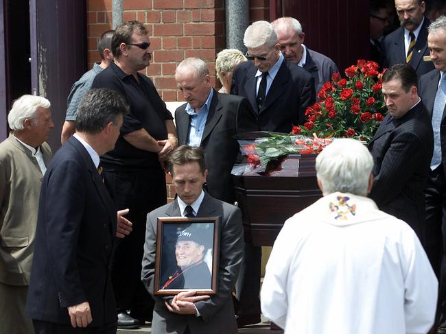 Kinniburgh’s casket is carried out Sacred Heart Church in Kew in December 2003. Picture: Brett Hartwig