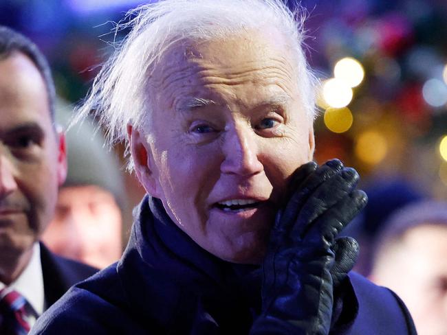 WASHINGTON, DC - DECEMBER 05: U.S. President Joe Biden yells out to the press while departing the 102nd National Christmas Tree Lighting Ceremony on the Ellipse on December 05, 2024 in Washington, DC. The 2024 National Christmas Tree is a 35-foot Red Spruce from the George Washington and Jefferson National Forests in Virginia.   Kevin Dietsch/Getty Images/AFP (Photo by Kevin Dietsch / GETTY IMAGES NORTH AMERICA / Getty Images via AFP)