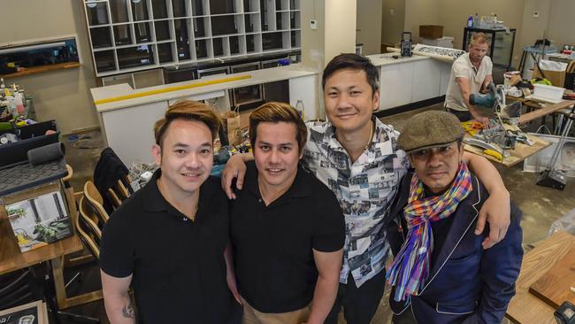 Business partners Phudisanat Ratanatilaka Na Bhuket, Tatsanai Suwannarat and Geng Sapphachai with Thai artist Pechsing Somnus inside the former Pranzo site. Picture: Roy VanDerVegt