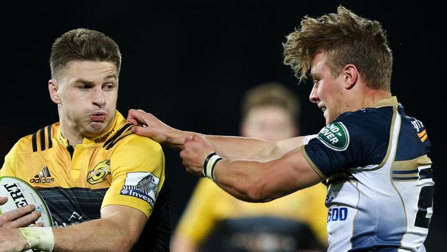 NAPIER, NEW ZEALAND - APRIL 21:  Beauden Barrett of the Hurricanes fends Jordan Jackson-Hope of the Brumbies during the round nine Super Rugby match between the Hurricanes and the Brumbies at McLean Park on April 21, 2017 in Napier, New Zealand.  (Photo by Hagen Hopkins/Getty Images)