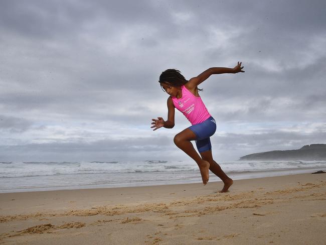 Malikye Kessie -12 on Maroubra Beach. Malikye won 2 gold medals and 1 silver at the recent Nippers state championships with South Maroubra SLSC. He has been undefeated for 4 years at the State Titles and lalso runs track for Randwick Botany Little Athletics. Local Sports star. Picture: John Appleyard