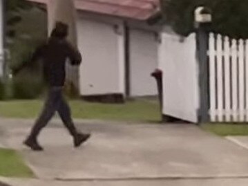 A youth, filmed by a resident, walking in Newport wit a hoodies pulled over his face, after he allegedly threw eggs at nearby homes. Picture: Supplied (Facebook)